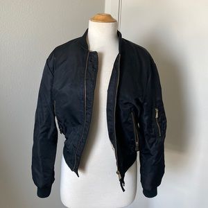 Black Zara bomber jacket with gold zippers